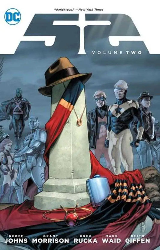 Fedora hat on white stone monument with red and black cloth for Infinite Crisis TPB Volume 02