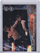 2017 TOPPS NOW WWE #129 AJ STYLES DEFEATS KEVIN OWENS, RETAINING THE US CHAMPS