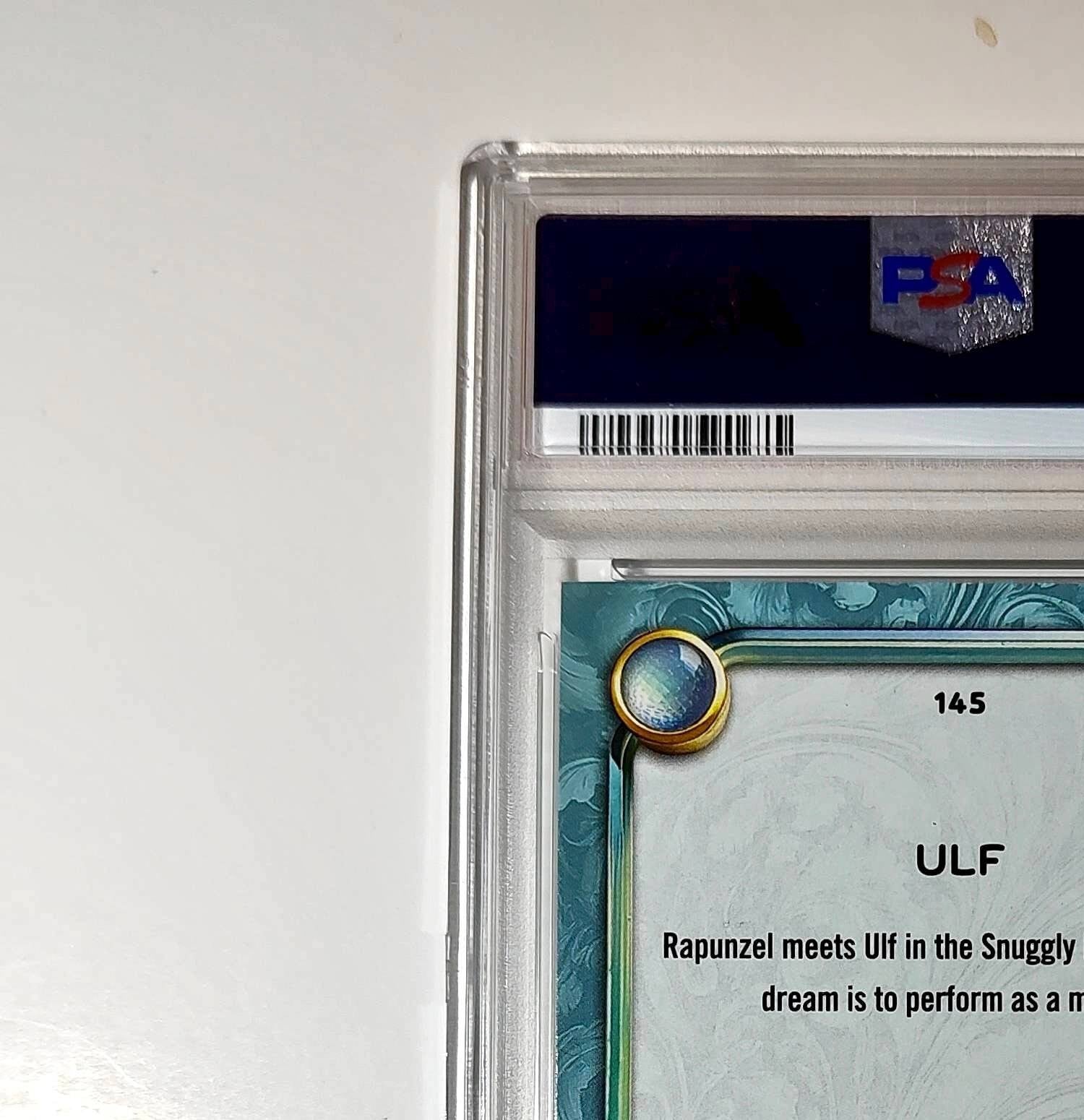 Ulf 2025 Topps Disney Wonder #145 Diamond Card Tangled PSA 9