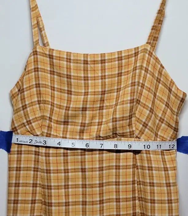 90s yellow plaid mini dress with spaghetti straps and a 12-inch waist measurement