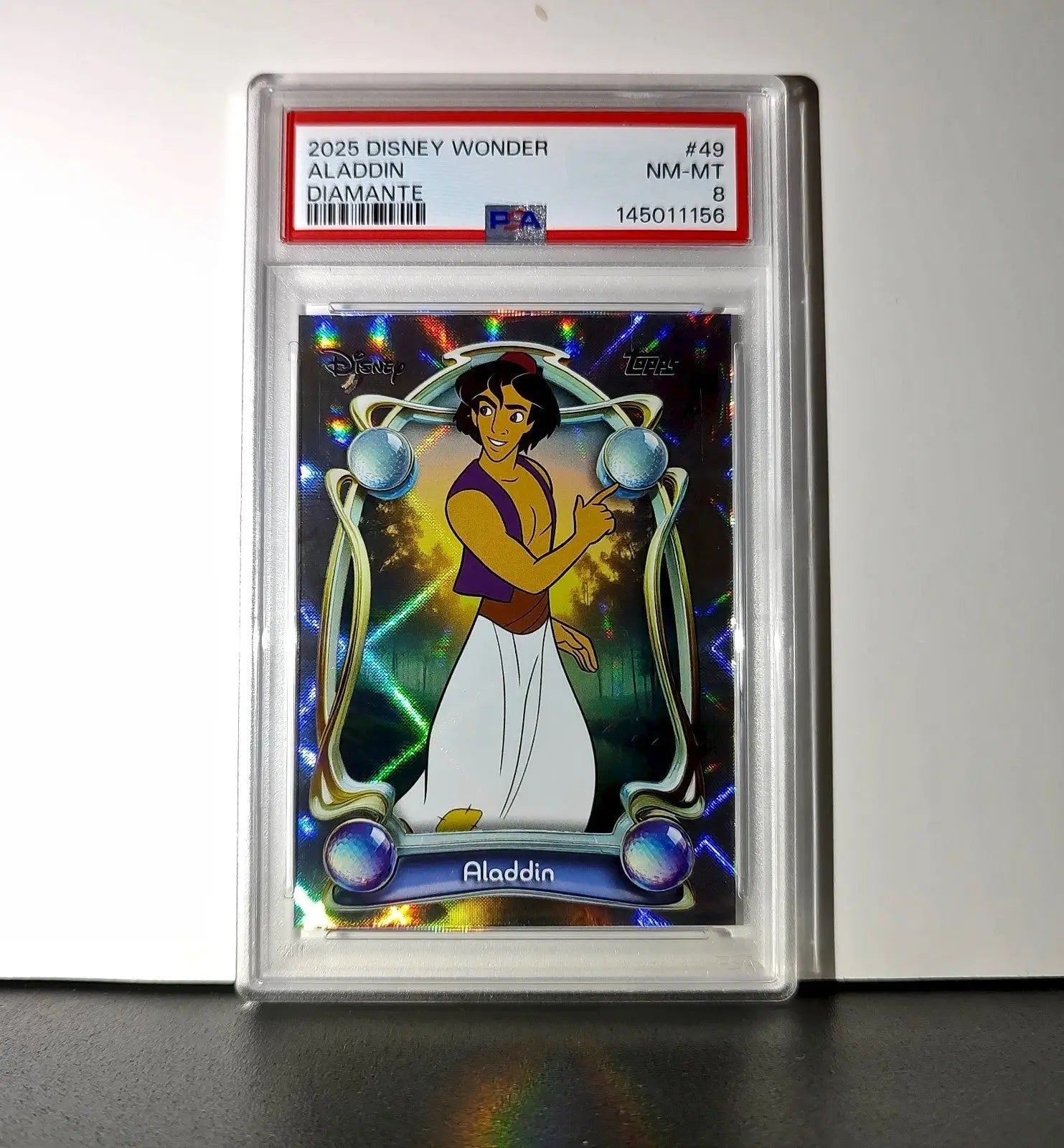 Aladdin 2025 Topps Disney Wonder #49 Winter Variant Card Aladdin PSA 8 - Non-Sports Card Single