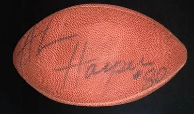 Autographed brown pebbled Dallas Cowboys football signed by Alvin Harper with JSA COA