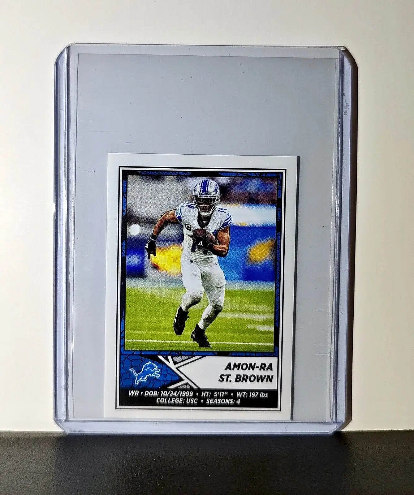 Amon-Ra St. Brown 2024 Panini NFL Sticker #382 Detroit Lions