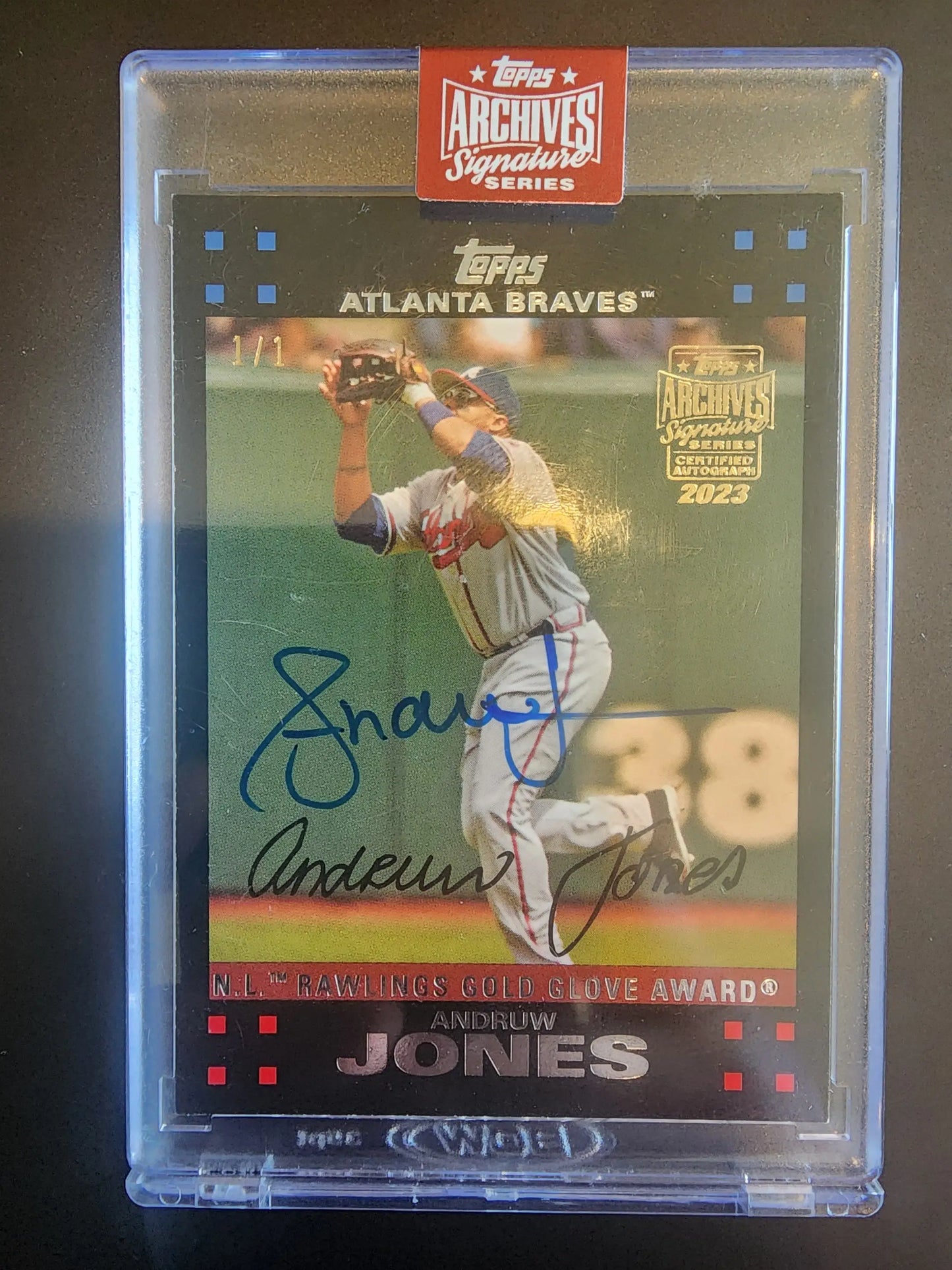 Signed Andruw Jones Topps Archives Signature series baseball card in a protective case