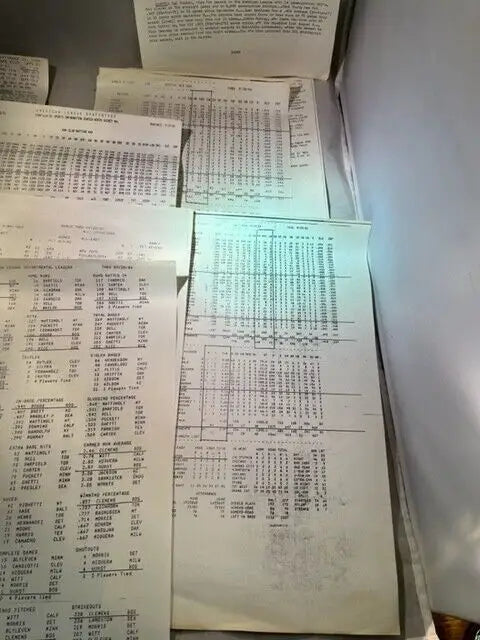 Stacked computer printouts of Baltimore Orioles at Boston Red Sox game press release