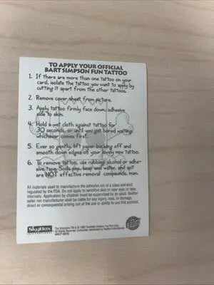 Bart Simpson skull tattoo instructions from Simpson Skull Skybox The Simpsons insert card