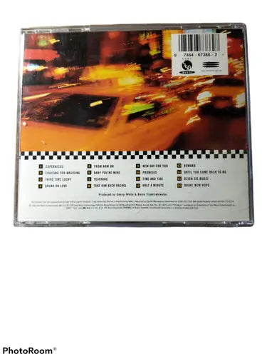 CD jewel case with Broadway live album art featuring blurred yellow taxis at night
