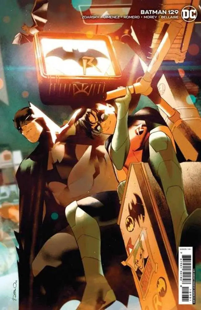 Comic book cover of Batman #129 featuring the Dark Knight in action poses