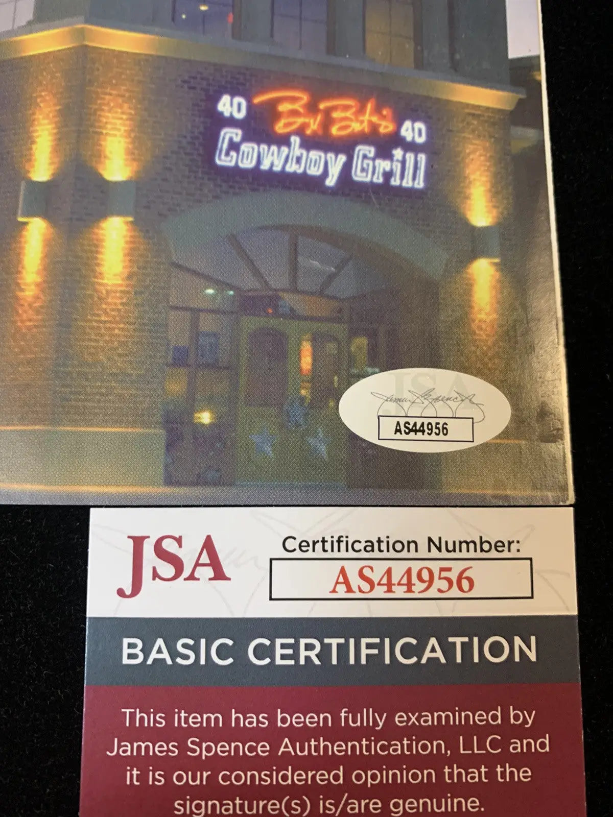Autographed Bob’s Cowboy Grill Menu photograph featuring Jason Garrett and Chris Bonoil JSA certified