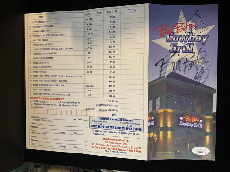 Autographed Cowboy Grill menu featuring Jason Garrett and Chris Bonoil signatures