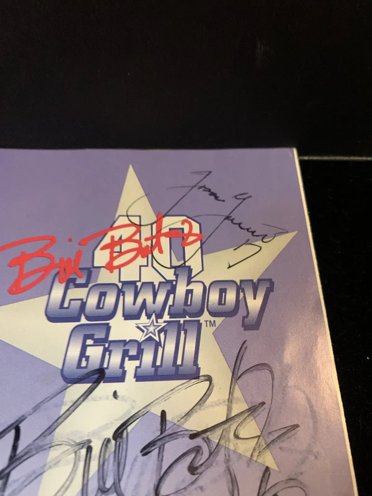 Signed 40 Cowboy Grill poster featuring Bill Bates, Jason Garrett, and Chris Bonoil