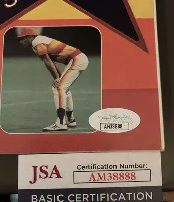 Autographed baseball card on Houston Astros souvenir program scorebook featuring Nolan Ryan