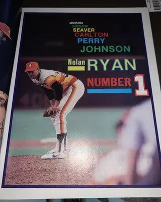 Nolan Ryan baseball poster on Houston Astros 1983 souvenir program scorebook