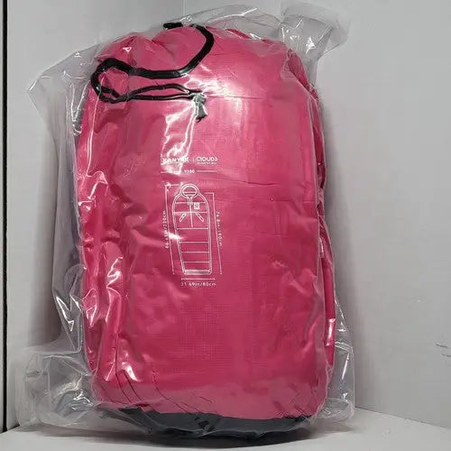 Vibrant pink Kanyak Cloud sleeping bag in clear plastic packaging for outdoor camping