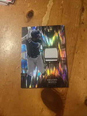 Brando Mayea baseball card from Panini Select Baseball 2024 Striped Patch series