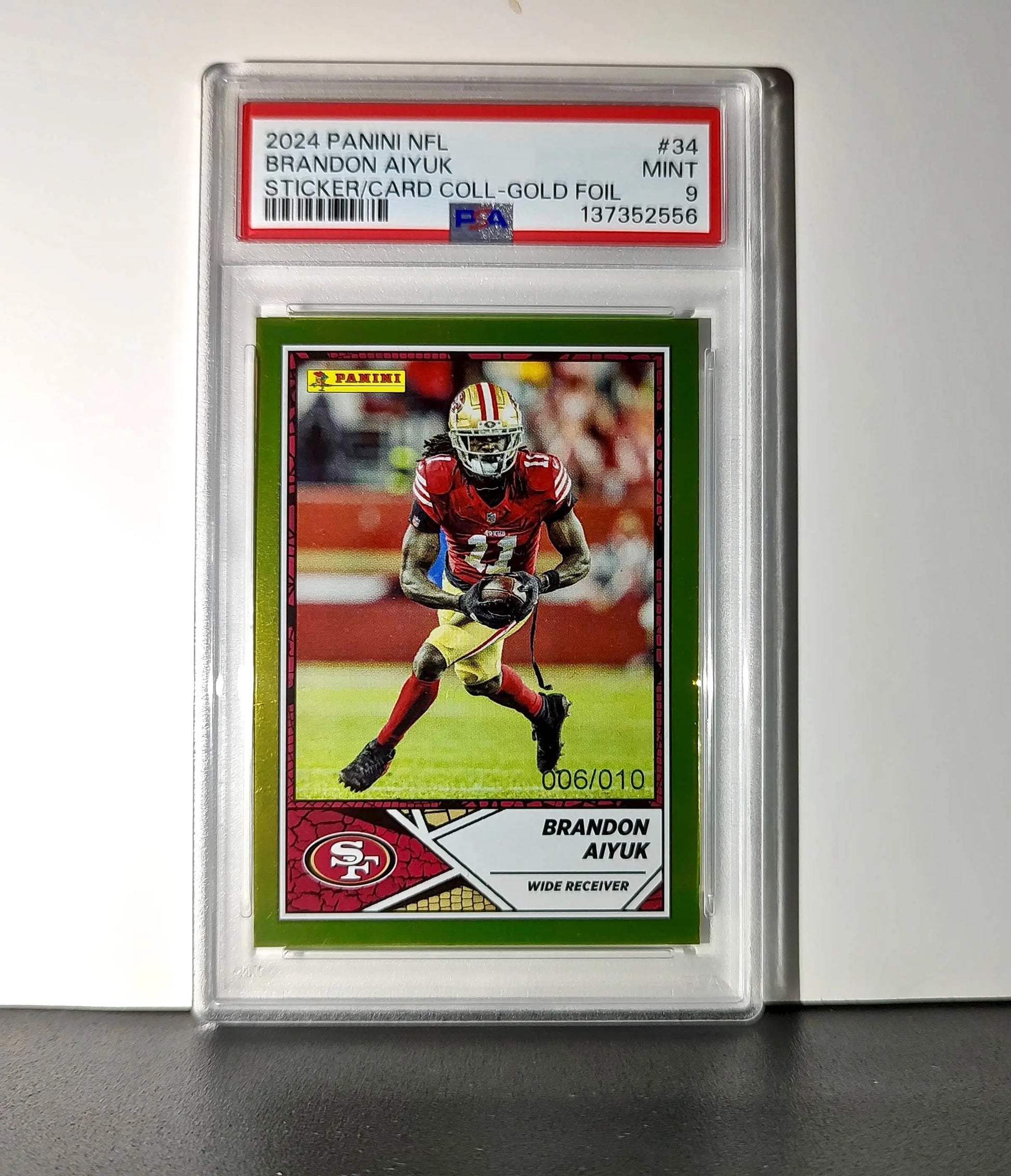 Brandon Aiyuk 2024 Panini Sticker Collection 006/010 #34 Gold Foil PSA 9 Mint - Football Card Single