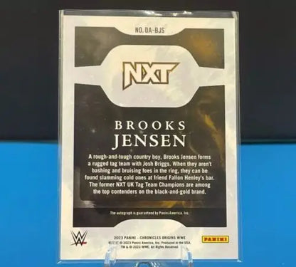 Brooks Jensen Origins Red Autograph from 2023 Panini WWE Chronicles wrestling card