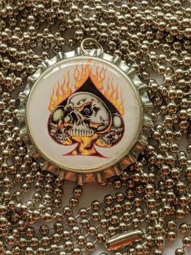 Burning skulls spade Bottle cap pendant necklace - Apparel