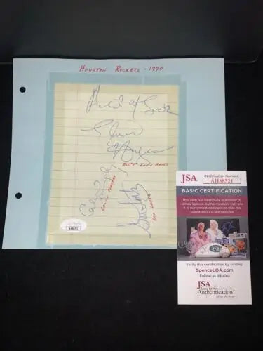 Signed page featuring Elvin Hayes memorabilia from the Houston Rockets collectible