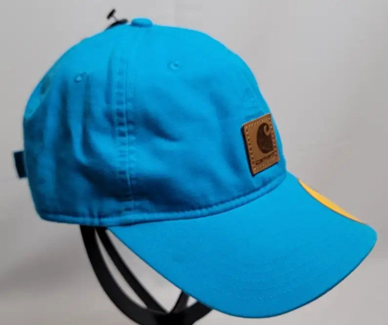 Bright blue Carhartt Force Canvas Patch Adjustable Cap with brown leather logo