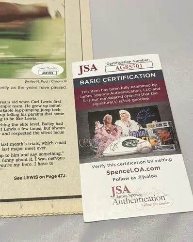 JSA authentication card for Carl Lewis July 4 1996 Houston Chronicle signed newspaper