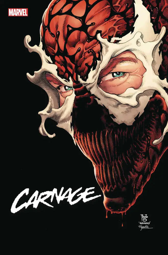 Red and white symbiote face with sharp teeth on Carnage #1 trading card
