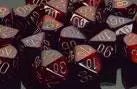 Pile of percentile dice from CHESSEX D10 Gemini Dice Sets showing various numbers