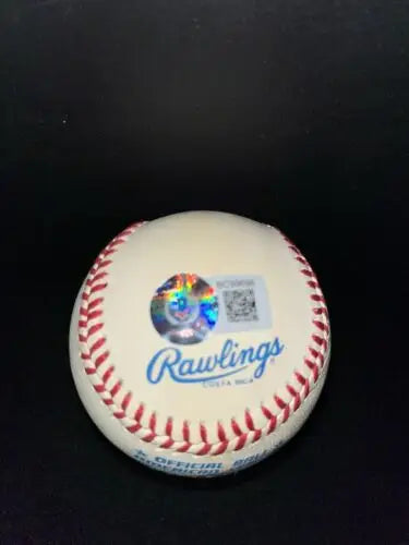 Chi-Chi Rodriguez signed MLB baseball with red stitching for collectors of baseball cards
