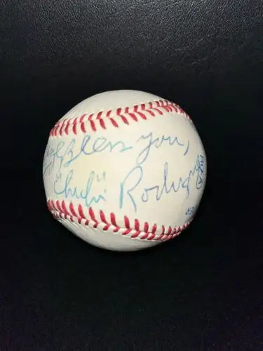 Autographed MLB baseball by Chi-Chi Rodriguez, perfect for baseball card collectors