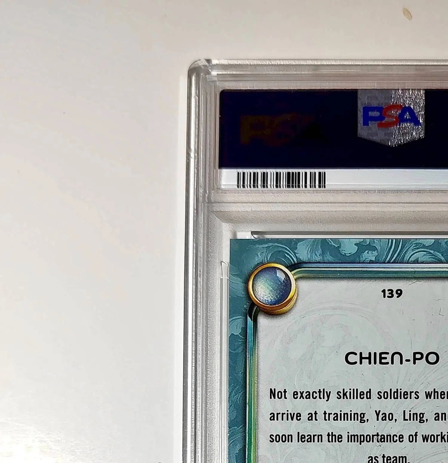 Chien-Po 2025 Topps Disney Wonder #139 Diamond Card Mulan PSA 7