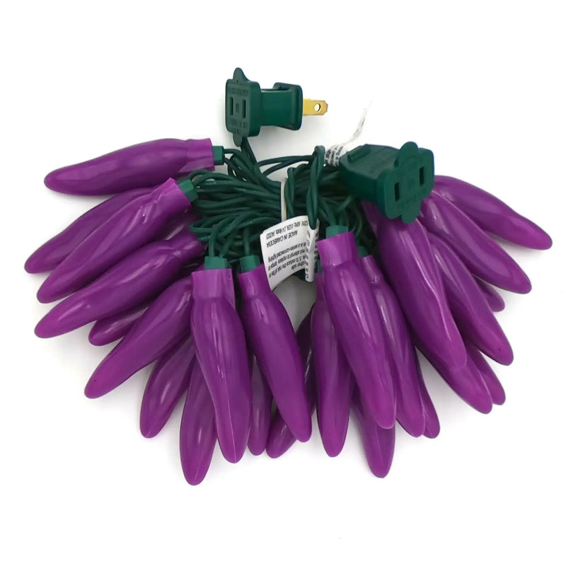 Purple chili pepper string lights with green wiring, perfect for fiesta style decor