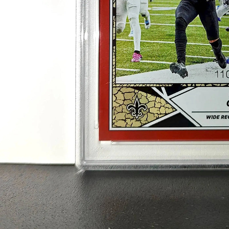 Chris Olave 2024 Panini Sticker Collection 110/299 #61 Red Foil PSA 9 Mint