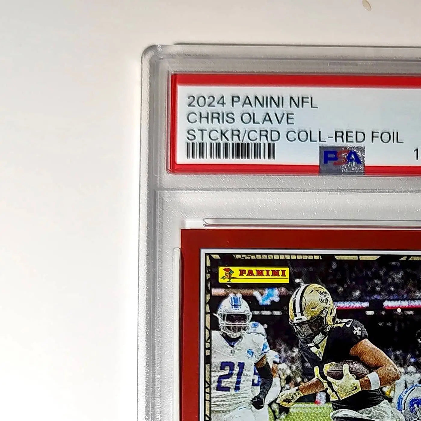 Chris Olave 2024 Panini Sticker Collection 110/299 #61 Red Foil PSA 9 Mint