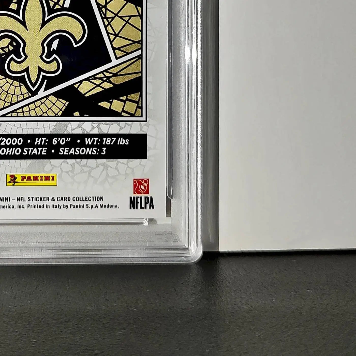 Chris Olave 2024 Panini Sticker Collection 110/299 #61 Red Foil PSA 9 Mint