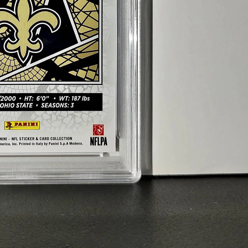Chris Olave 2024 Panini Sticker Collection 110/299 #61 Red Foil PSA 9 Mint