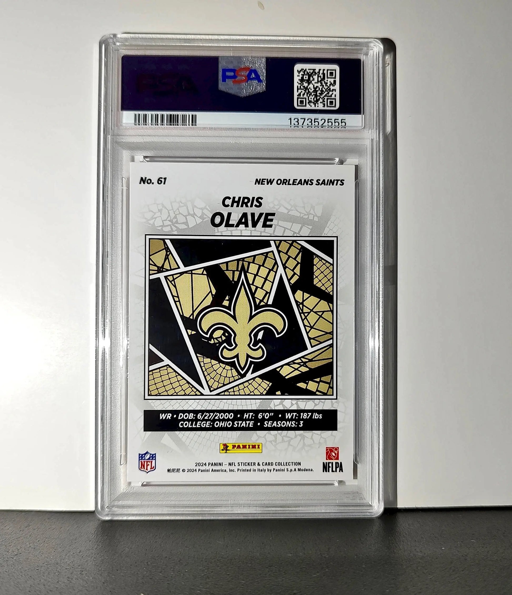 Chris Olave 2024 Panini Sticker Collection 110/299 #61 Red Foil PSA 9 Mint