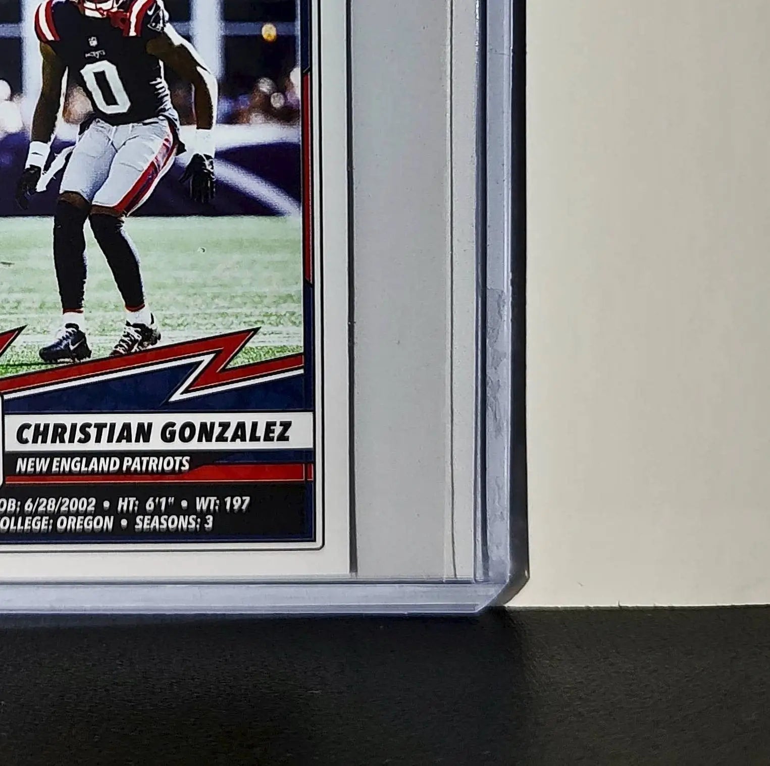 Christian Gonzalez 2025 Panini NFL #82 Sticker Patriots