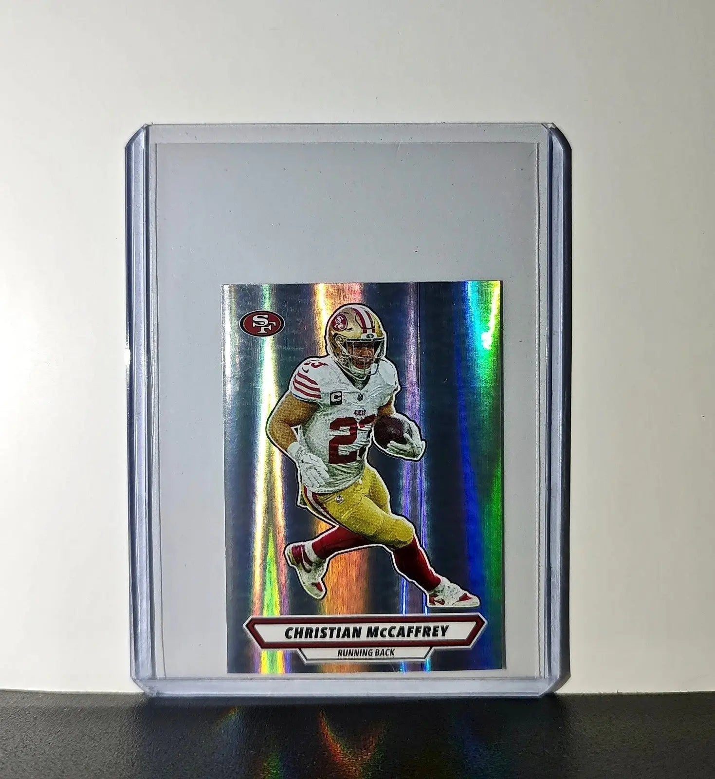 Christian McCaffrey 2025 Panini NFL #523 Foil Sticker 49ers