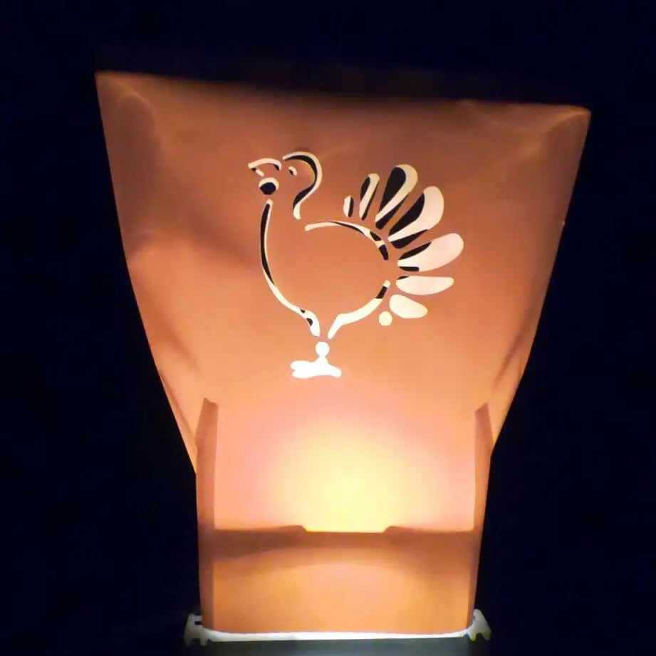 Decorative illuminated lantern with cut-out rooster design from Classic Holiday LUMINARY SET