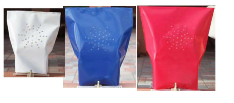 Three collapsible perforated luminarias bags in white, blue, and red for electric luminarias
