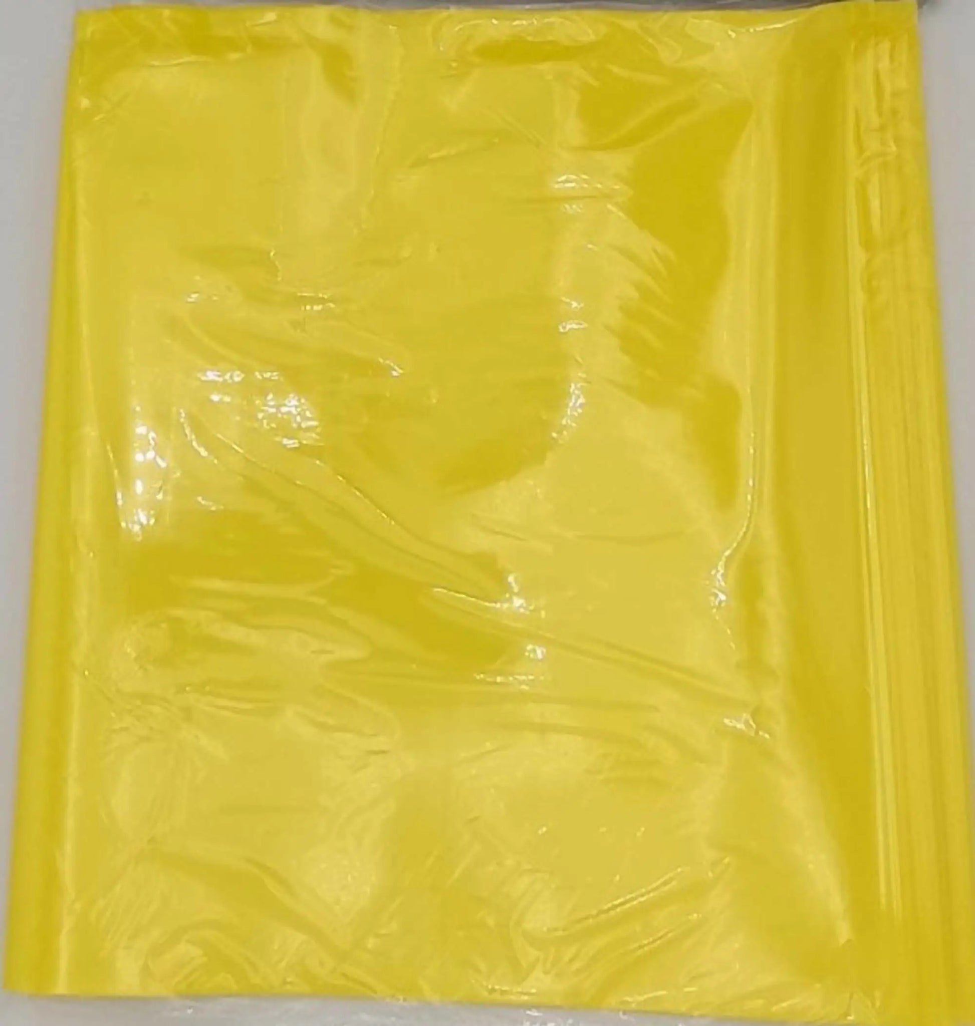 Bright yellow Plasticine block from Classic LUMINARY SET for luminarias bags and crafts