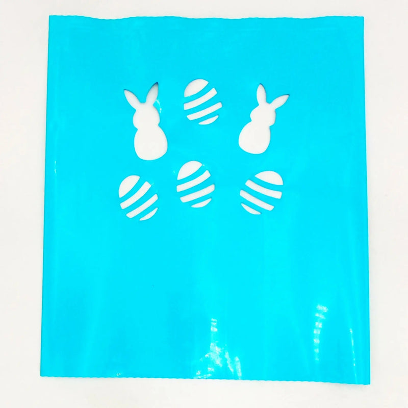 Blue plastic Easter gift bag with bunny and egg cutouts for luminarias bags or electric luminarias