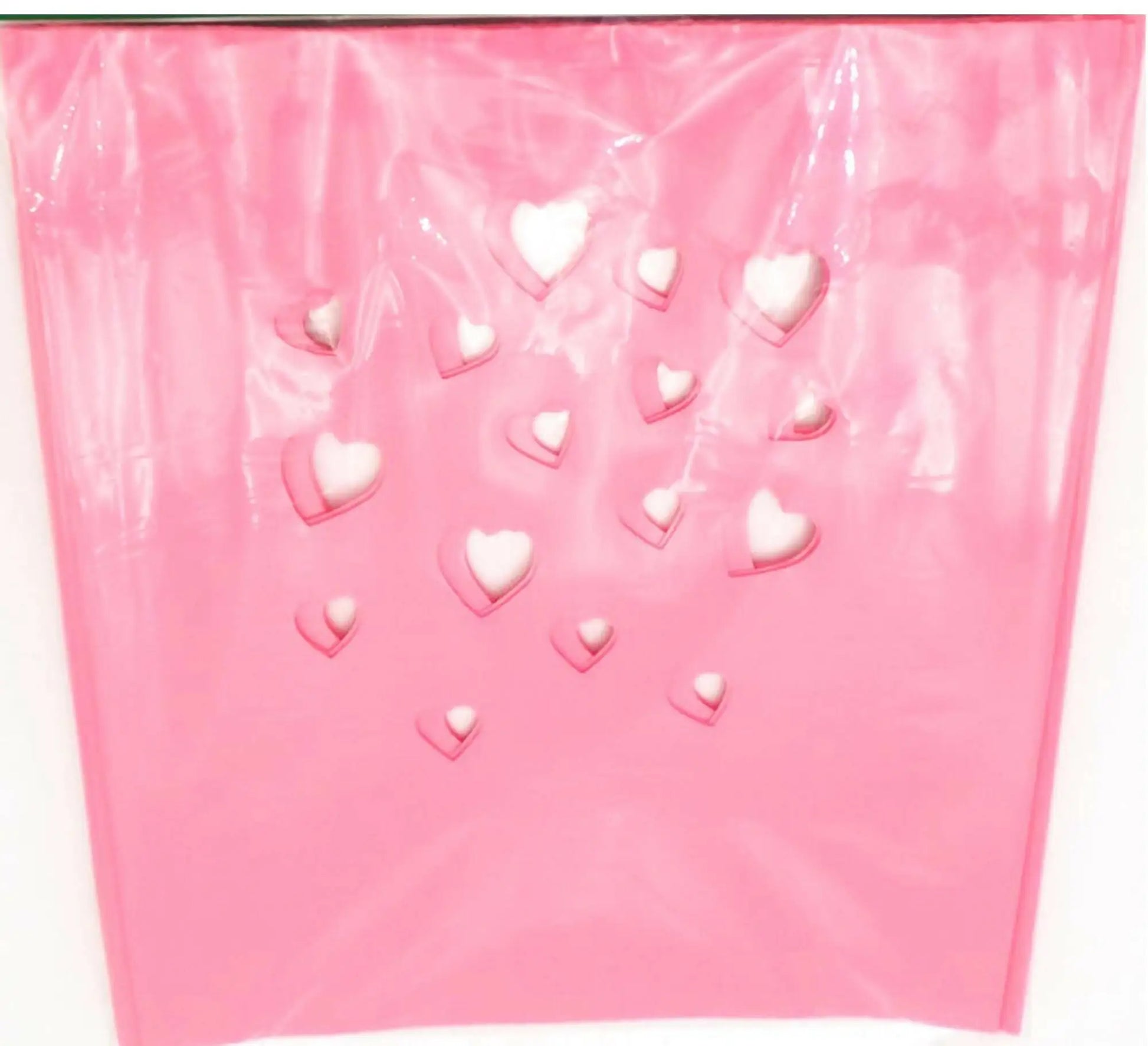 Pink plastic gift bag with white hearts from Classic LUMINARY SET, perfect for luminarias bags