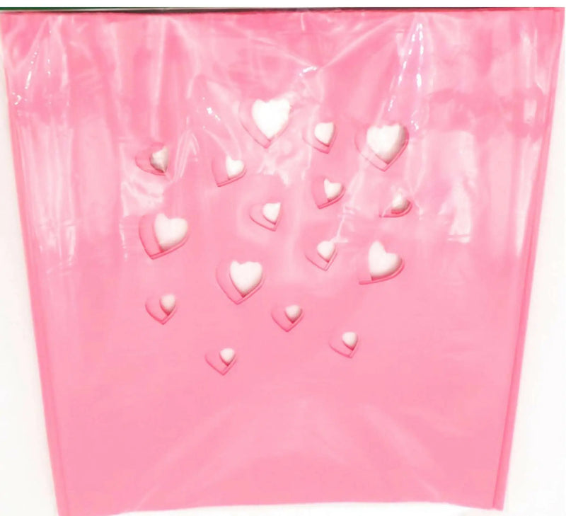 Pink plastic gift bag with white hearts from Classic LUMINARY SET, perfect for luminarias bags