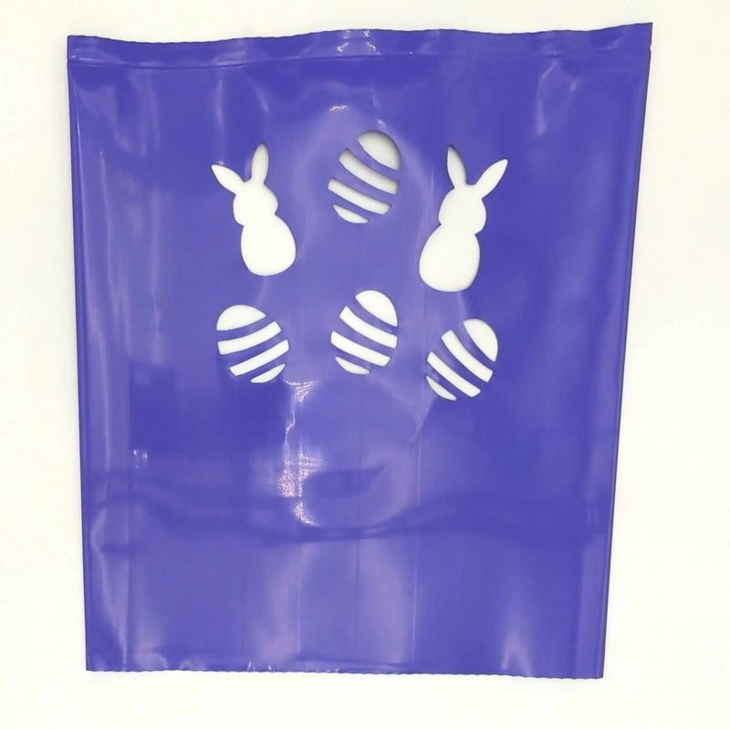 Purple plastic Easter luminarias bags with bunny and egg cutouts for luminarias bags