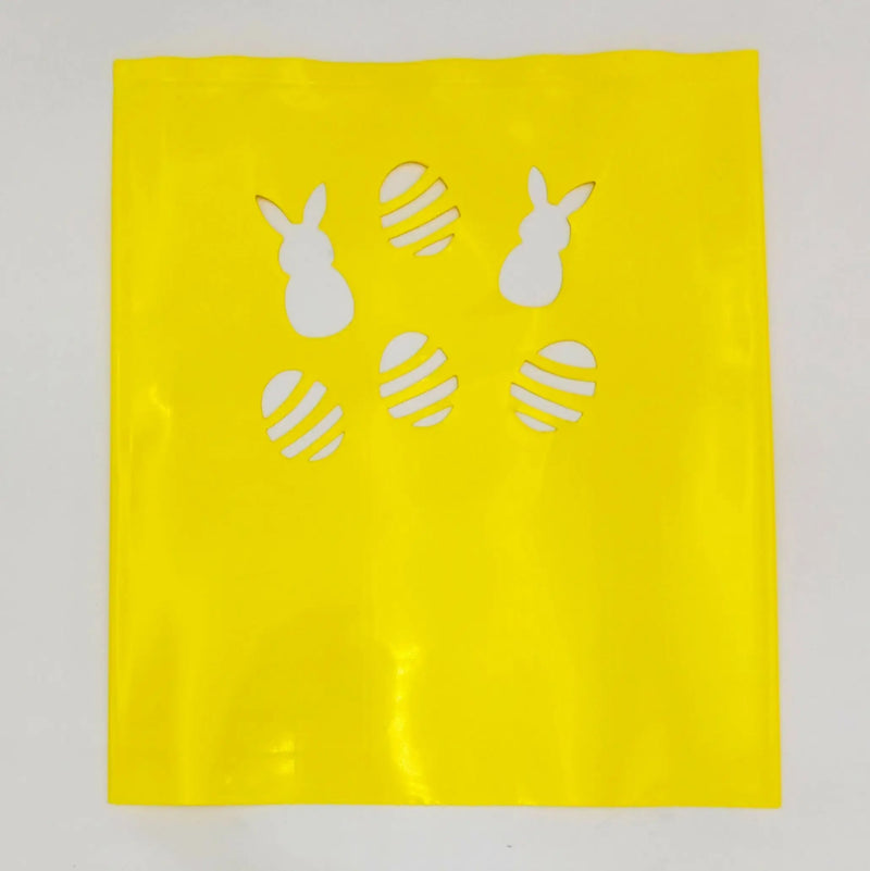 Yellow Easter-themed stencil with bunnies and eggs for Classic LUMINARY SET luminarias bags