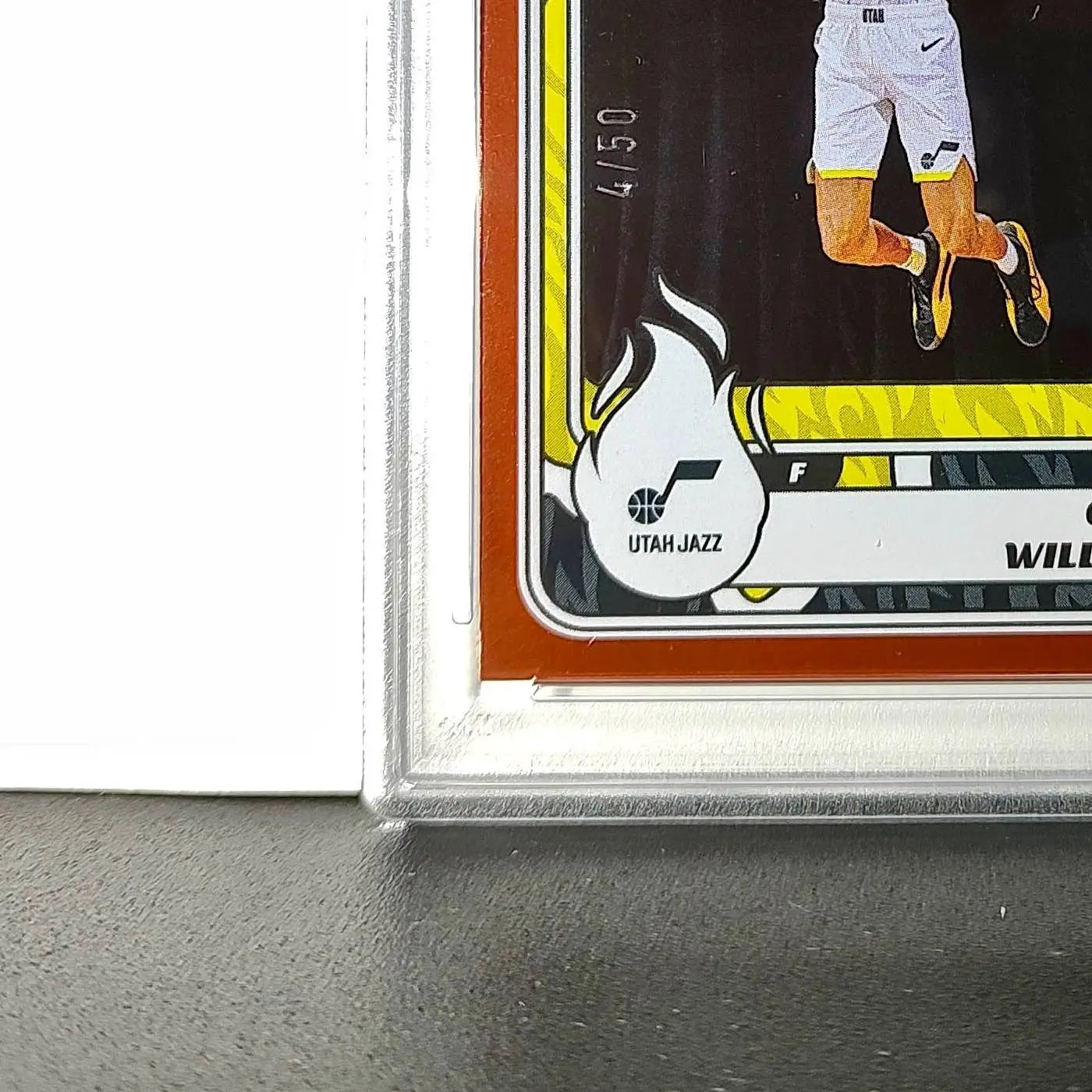 Cody Williams Rookie 2024-25 Panini NBA #99 Sticker 4/50 Orange Foil PSA 7 NM - Basketball Card Single