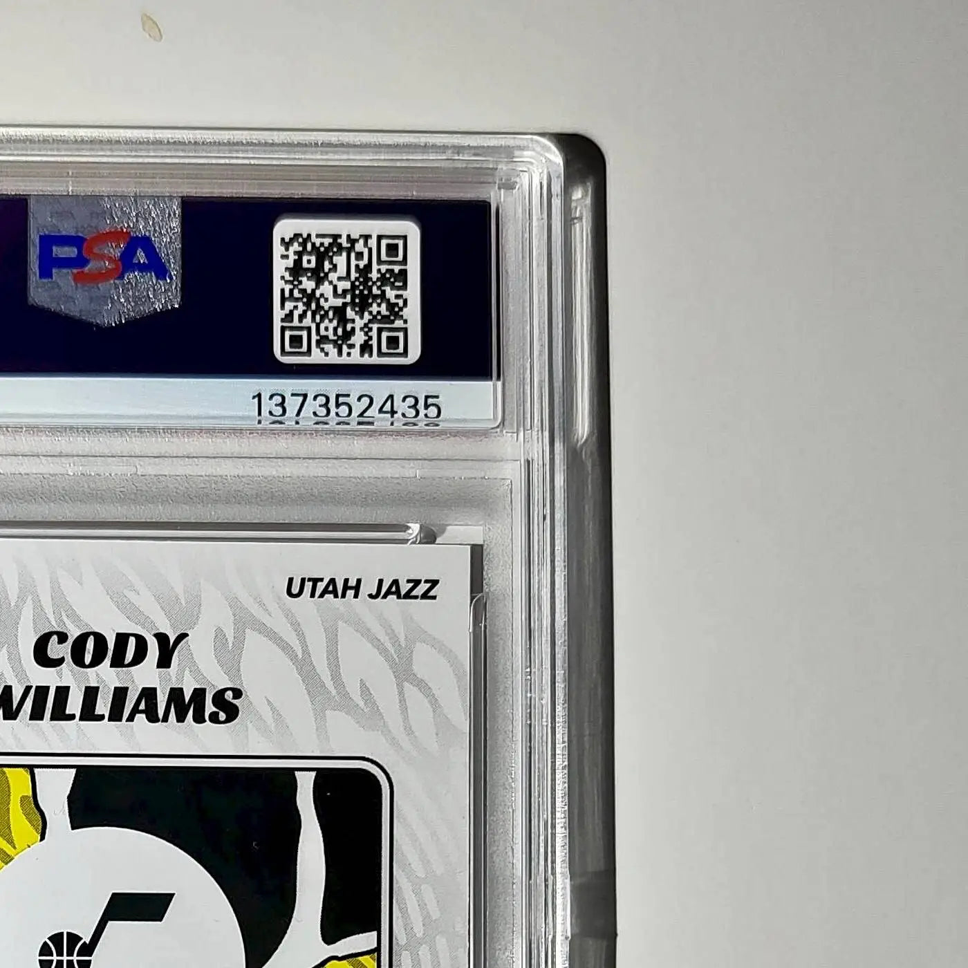 Cody Williams Rookie 2024-25 Panini NBA #99 Sticker 4/50 Orange Foil PSA 7 NM - Basketball Card Single