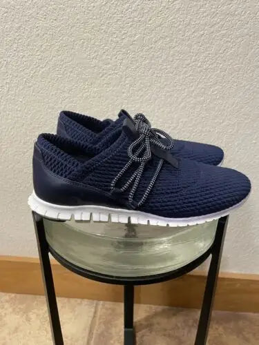 Navy blue knit sneakers from Cole Haan Zerogrand women’s collection for stylish comfort