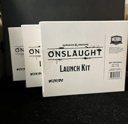 Three Dungeons and Dragons Onslaught Launch Kits showcasing sealed foil monsters